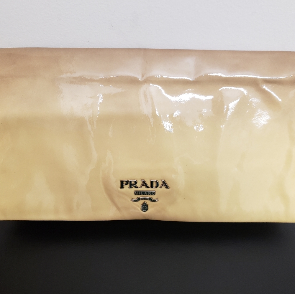 Authentic Prada cream color patent leather clutch